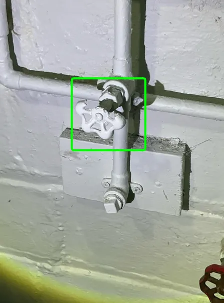 A damaged handle on a water pipe near laundry found during a home inspection in Brookfield.