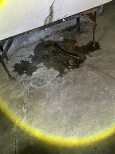 damaged laundry tub found during a home inspection in Cleveland Heights