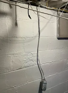 Improperly installed high voltage receptacle found during a home inspection in Euclid Heights.