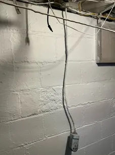 Improperly installed high voltage receptacle found during a home inspection in Euclid.