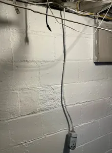 Improperly installed high voltage receptacle found during a home inspection in Garfield Heights.