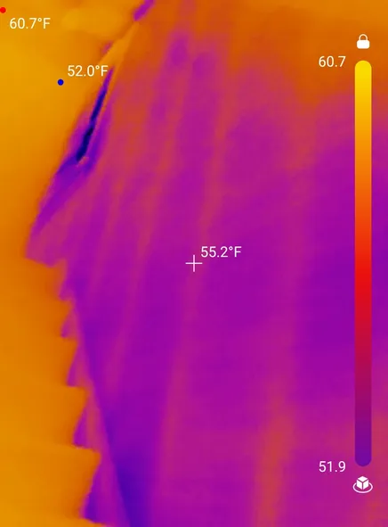 Inconsistent insulation on the wall of the stairwell found during a home inspection in Parma.