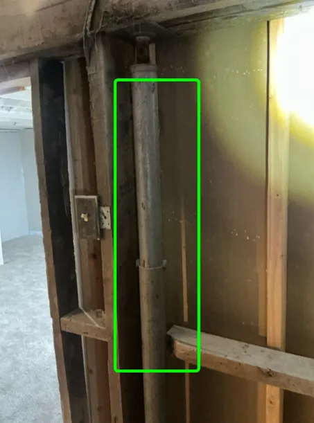 A temporary post that is permenantly installed found during a home inspection in Solon.