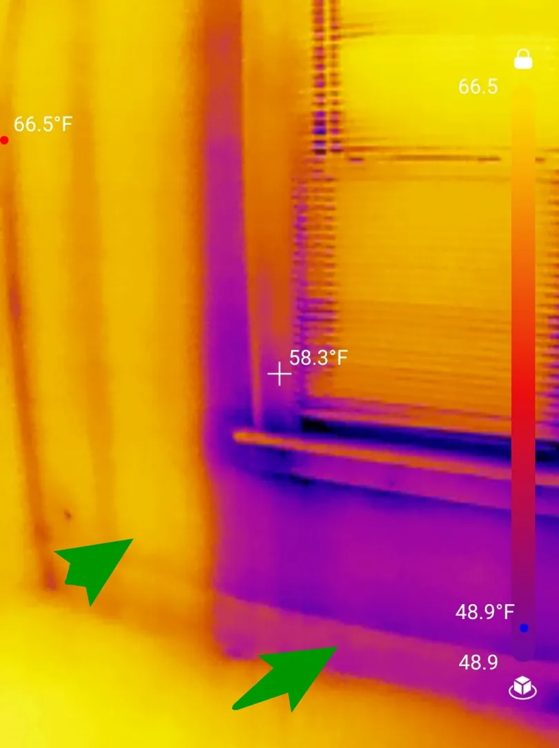 A detailed review revealed Missing insulation under the window in Copley observed during a home inspection.