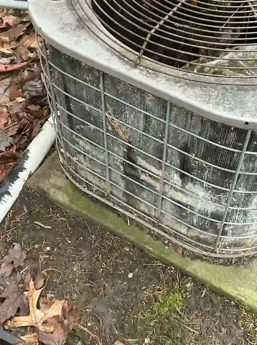 The home inspector identified Damaged fins on AC condenser in Lyndhurst during the home inspection.