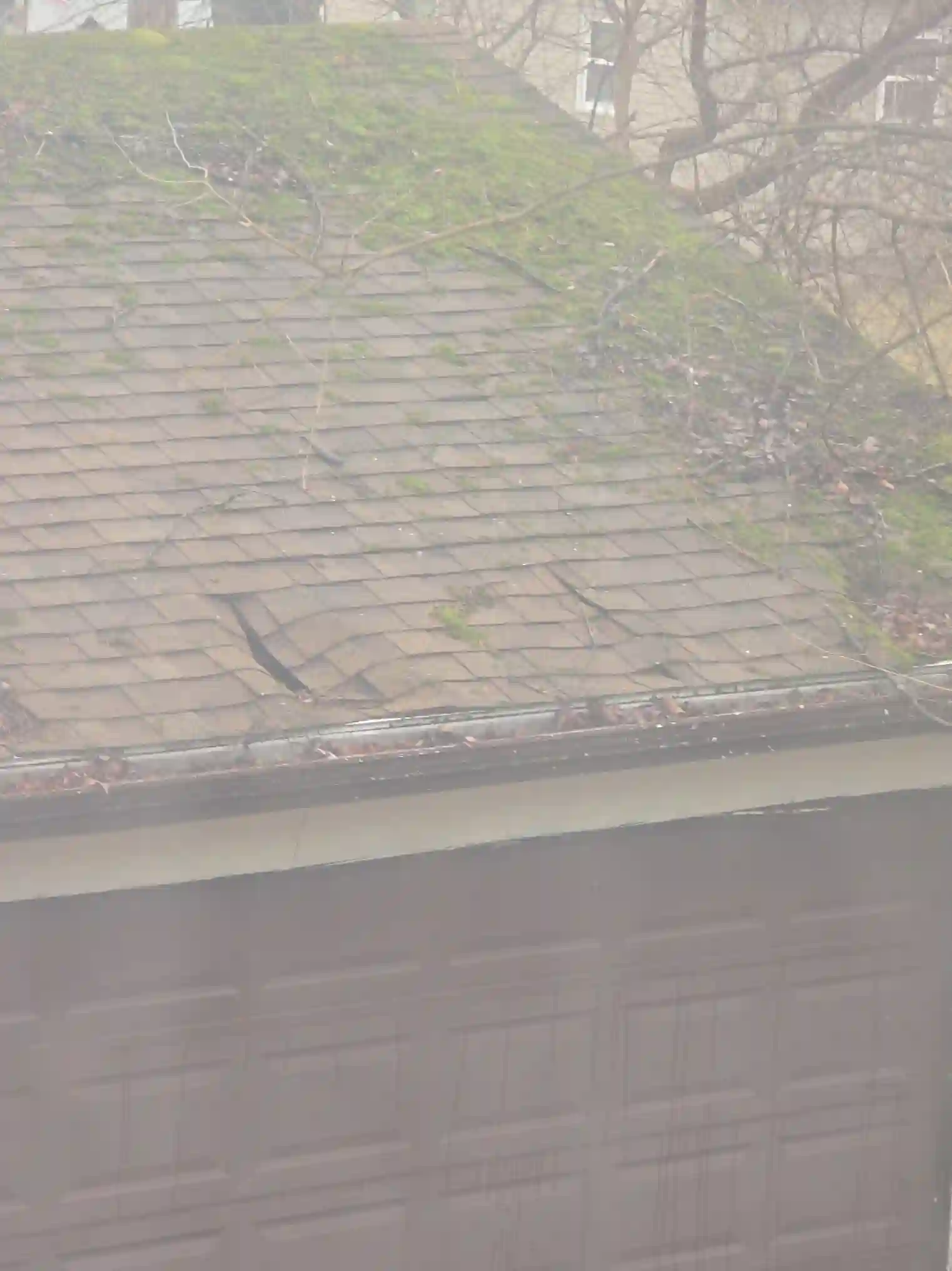 Evidence of Severely damaged garage roof in Solon was observed during the home inspection.