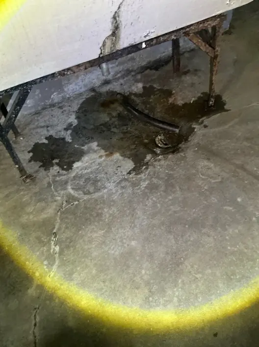 Found during our home inspection: Damaged laundry tub in Stow.