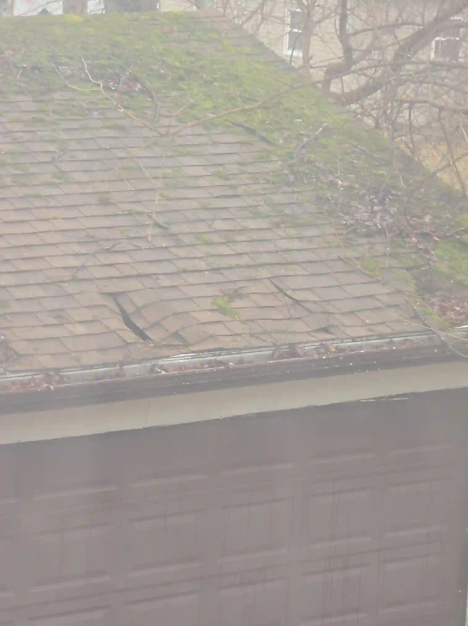 A detailed review revealed Severely damaged garage roof in Strongsville observed during a home inspection.