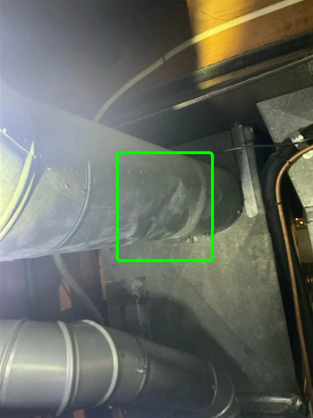 Evidence of Dented HVAC duct in Wickliffe was observed during the home inspection.
