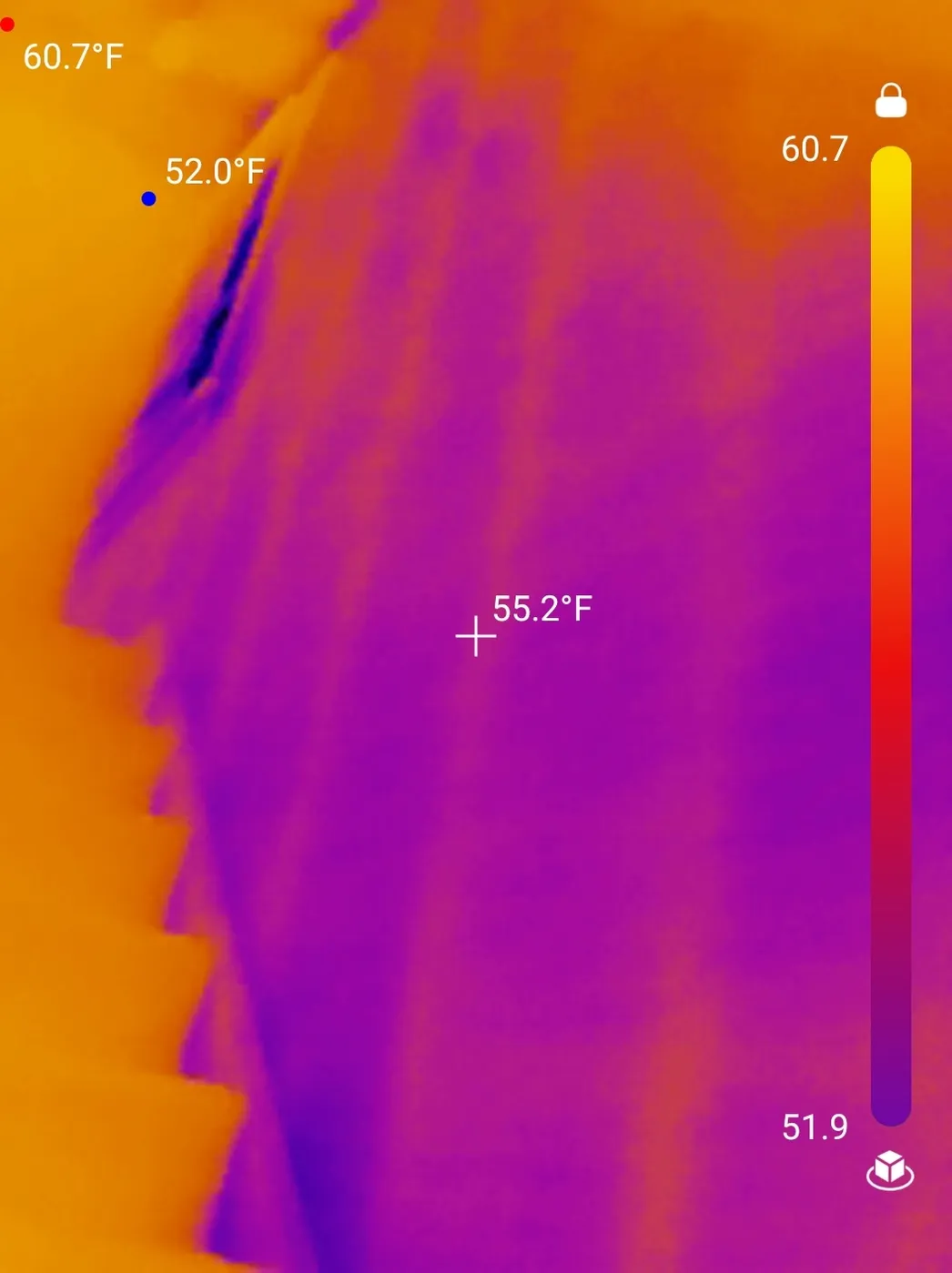 While evaluating the property, the home inspector discovered Inconsistent insulation on the wall of the stairwell in Wickliffe.